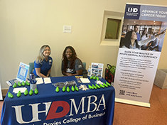 MBA Staff: Amanda Trevizo and Ikea Jernigan recruiting MBA students during the Hot Spot Commencement Shot Initiative in the Shea