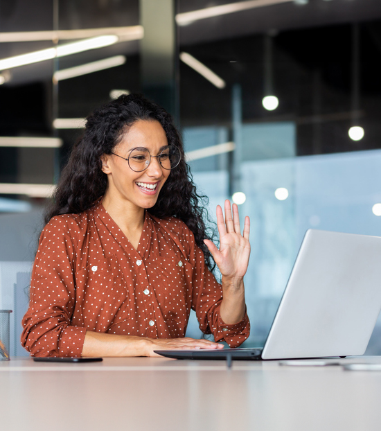 female student in  front of a laptop