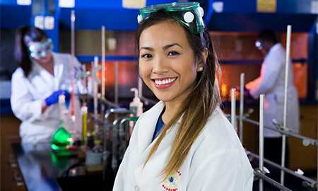 Girl smiling in science lab