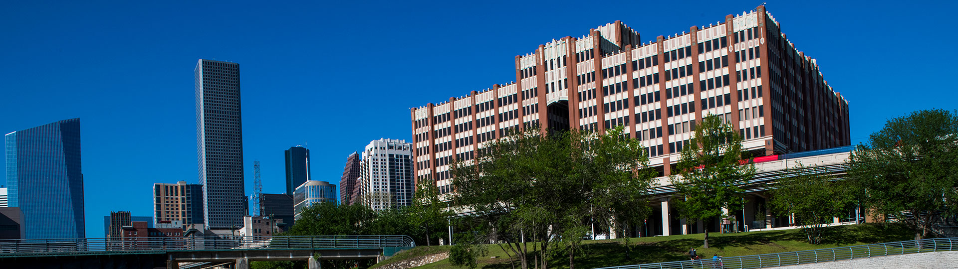 View of UHD One Main Building and Houston downtown skyline