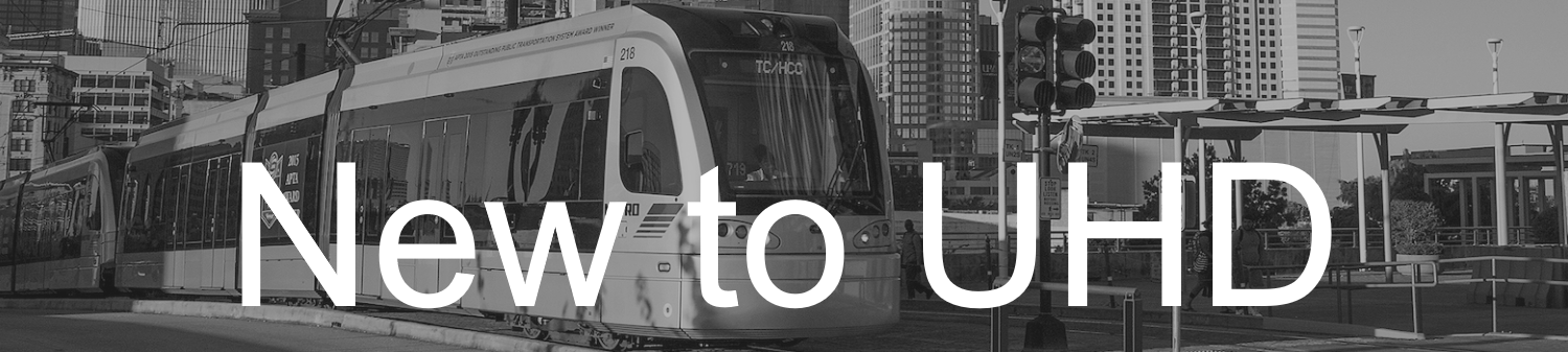 Monorail in black and white with New to UHD text on top