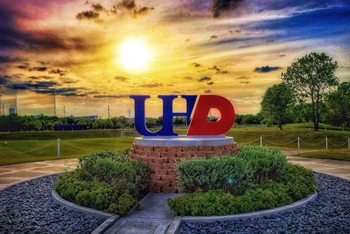 UHD sign during a sunset.